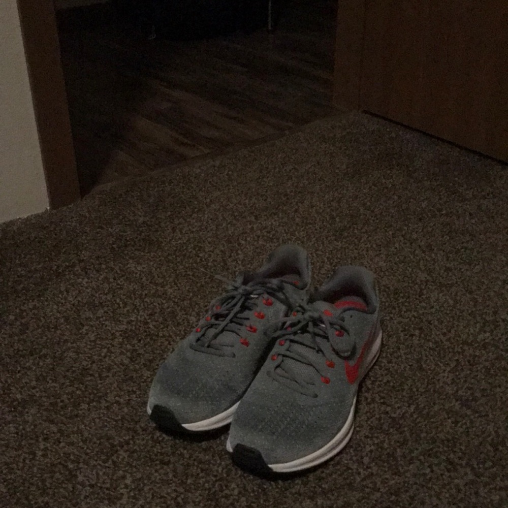 Crimson and grey nike shoes